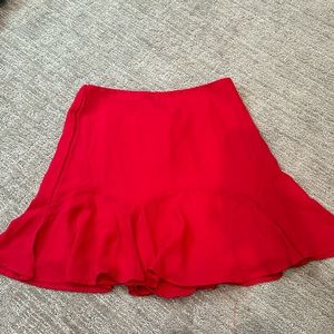 Red Francesca’s Rixxi Collection mini fluted skirt. Size medium, never worn.